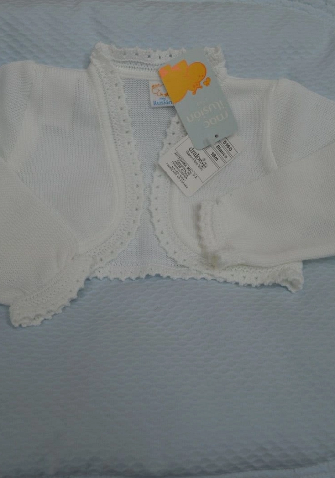 Chaqueta de perlé en blanca niña.