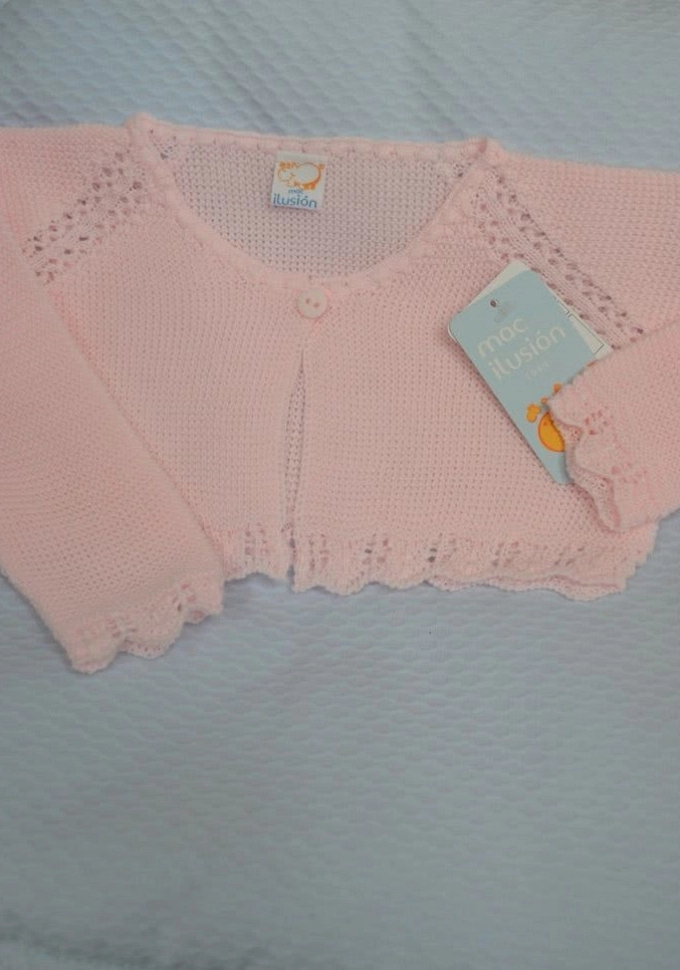 Chaqueta perlé de niña en rosa.