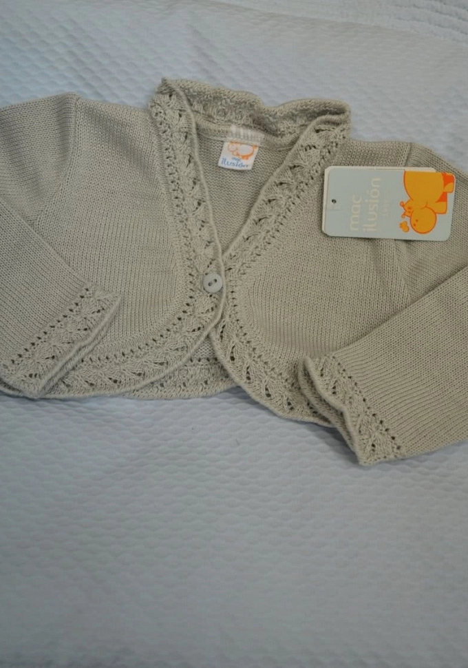 Chaqueta perlé niña en gris.