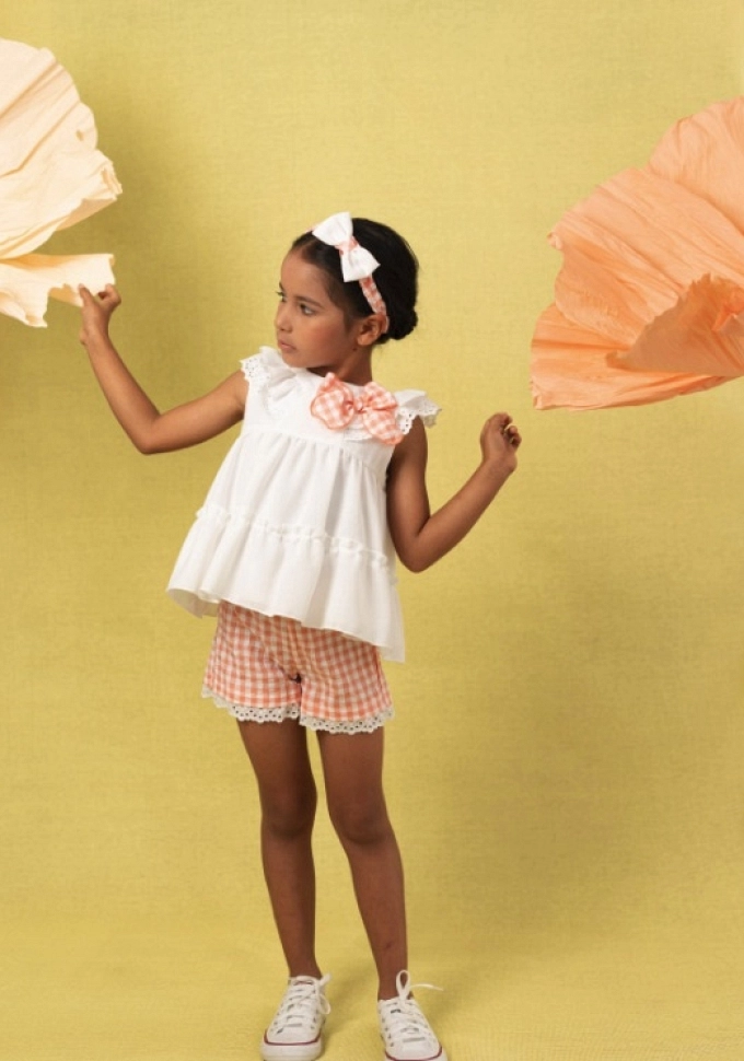 Conjunto de niña  en cuadros color naranja.Basmarti.
