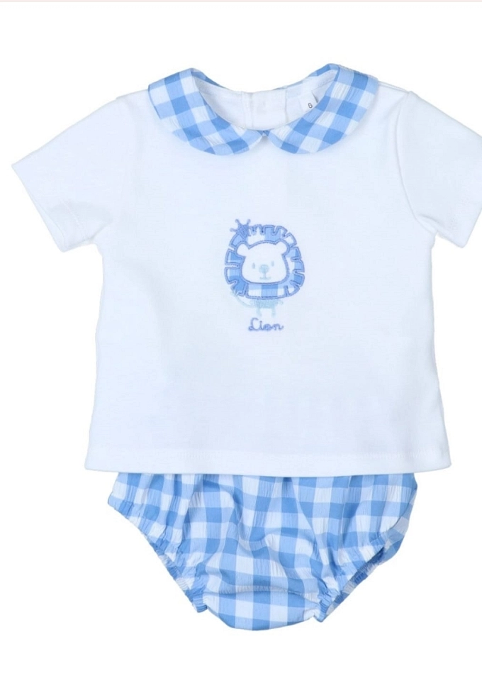 Conjunto de niño con un león en color azul. Conjunto de niño con un león en color azul.