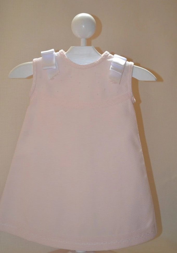 Faldón piqué en rosa.